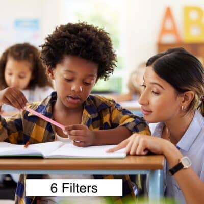 Photo of a teacher working with a student at his desk with the text "6 Filters" below the student. Image is to represent Greenwave Dirty Electricity Filters Classroom Kit.