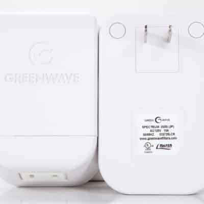 Photo of front and back of a 2-prong Greenwave Spectrum 2500i dirty electricity filter
