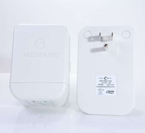 Photo of front and back of Spectrum 2500i Dirty Electricity Filter with a 3-prong plug and built-in outlet