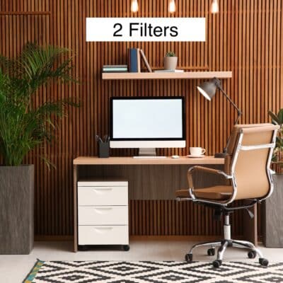 Photo of office with desk, computer, chair, and decorative accessories. The text "2 Filters" appears above the desk. Image represents Greenwave Dirty Electricity Filters Standard Office Kit